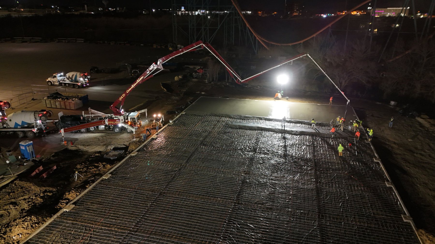 Night concrete pour with rebar grid — TRX Construction