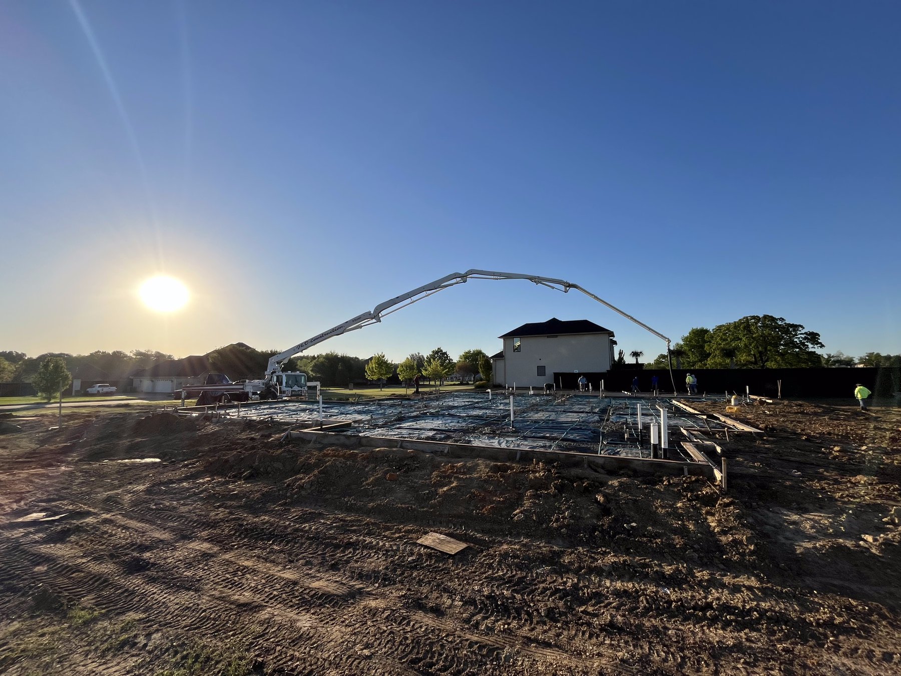 Sunrise concrete pour with pump truck — TRX Construction